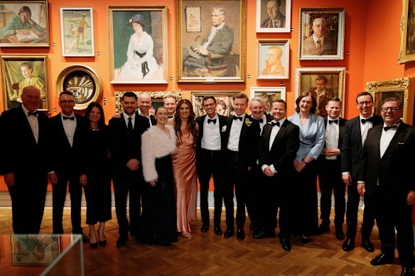 Current and former Liberal politicians gathered to celebrate the wedding of state MP Chris Rath (centre) and Patrick Wynne at the State Library of NSW.