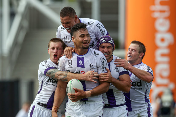 Melbourne Storm recruit Eliesa Katoa celebrates his try against the Warriors.