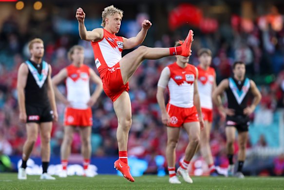 Jesse Dattoli of the Swans kicks a goal.