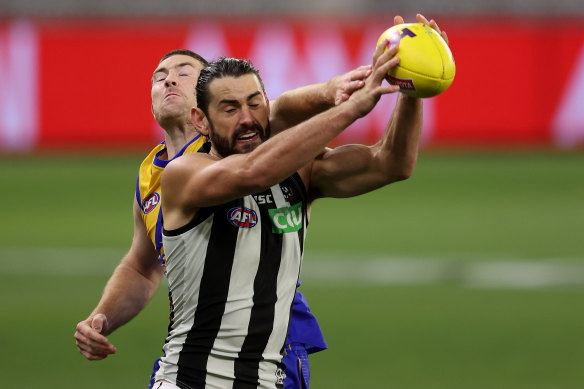 'Cherry ripe': Collingwood ruckman Brodie Grundy in action against the Eagles.