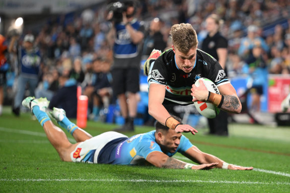 Winger Sam Stonestreet scores a try for Cronulla on Friday night.