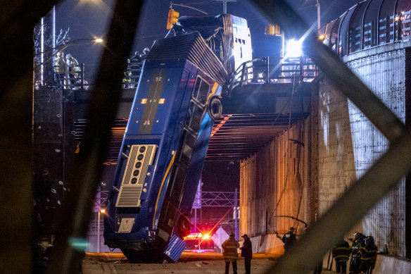 The bus was left dangling after it came off the road in the Bronx. 