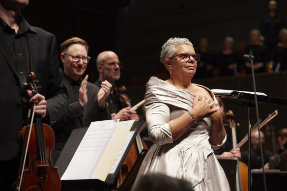 Conductor Benjamin Northey applauds composer and soloist Deborah Cheetham Fraillon at a 2023 performance in Melbourne.