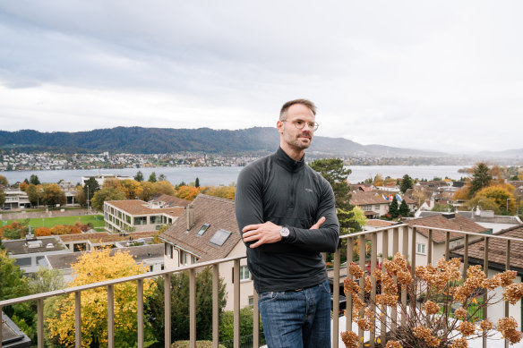 Philip Skiba on the terrace of his rental home in Zollikon, Switzerland, with a view of Lake Zurich.