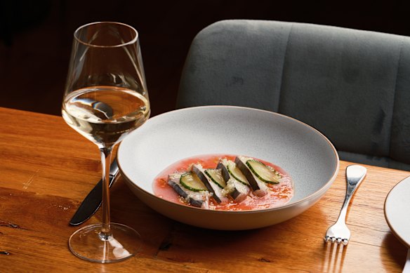 Ginveristy gin-cured fish with fermented tomato and finger lime.