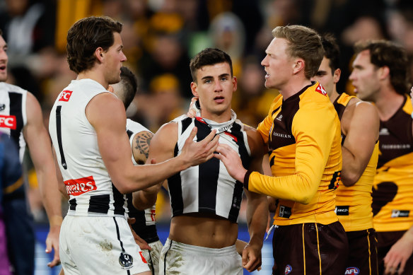 Nick Daicos in the thick of it for Collingwood against Hawthorn.
