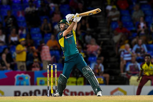 Glenn Maxwell hits a six during the fourth T20 international cricket match between West Indies and Australia in St Kitts.