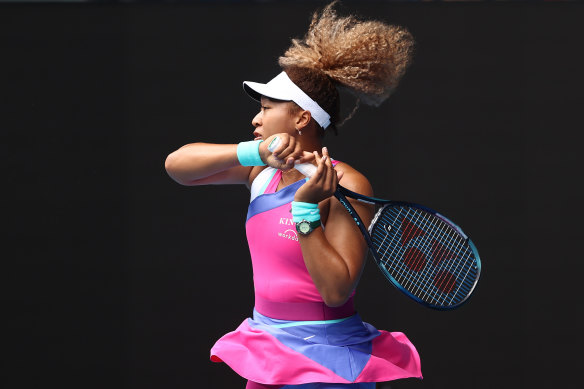 Naomi Osaka plays a forehand on day one of the Australian Open. 