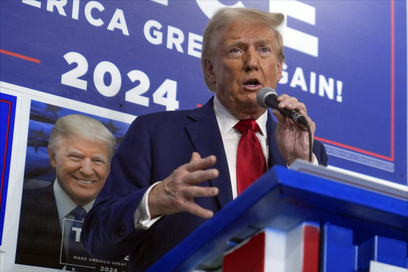  Donald Trump speaks as he visits a campaign office,  in Hamtranck, Michigan. 