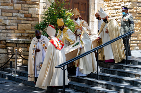 Clerics carry the coffin after the funeral for Anglican Archbishop Emeritus Desmond Tutu at the St George’s Cathedral.
