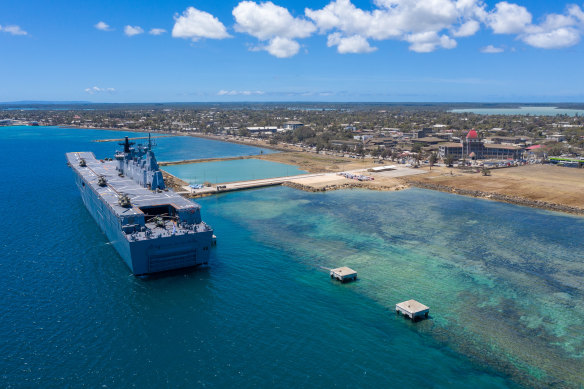 HMAS Adelaide, pictured at the Tongan capital of Nuku’alofa, has experienced a major power outage. 