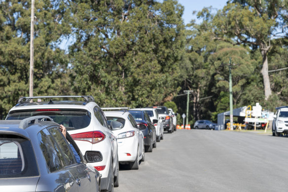 People line up for drive through testing in Huskisson on the NSW South Coast on Wednesday.