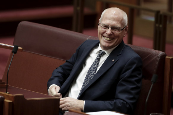 Senator Jim Molan reacts prior to delivering his first speech in the Senate at Parliament House in Canberra. 