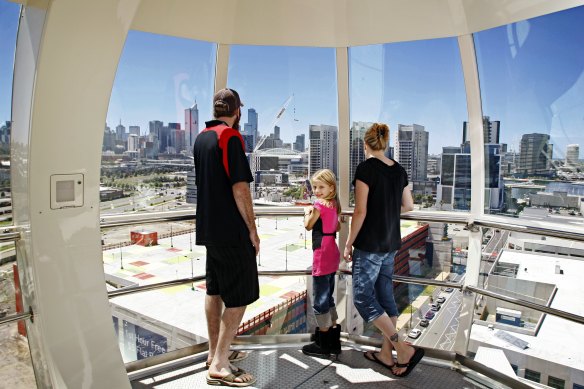 A family rides the wheel in 2008, 
when it opened under the name the Southern Star.