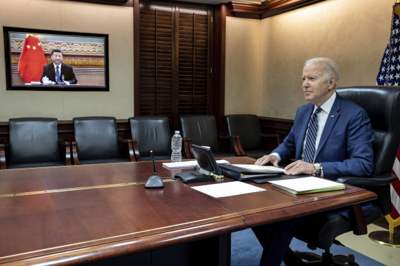 President Joe Biden meets virtually from the Situation Room at the White House with China’s Xi Jinping.