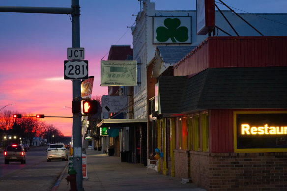 A sunset turns the sky over O’Neill a vivid pink. 