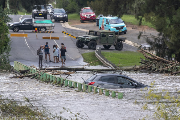 A submerged car on a bridge over the Nepean River at Cobbitty this week. 