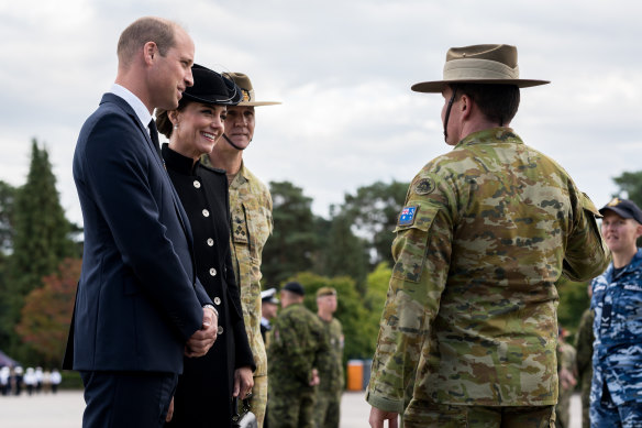 William and Catherine, the Prince and Princess of Wales, speak with Australian Army Captain Joshua Downs, who marched in the late Queen Elizabeth II’s state funeral procession.