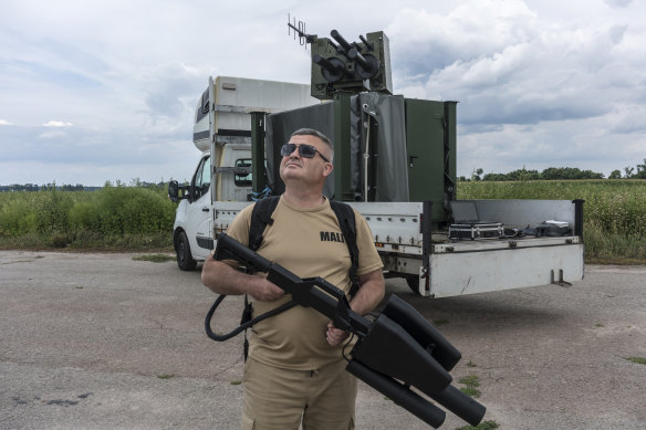 Yurii Momot, a founder of Piranha-Tech, with an anti-drone gun that can jam the communications signals used to control small commercial drones, in Kyiv, Ukraine.
