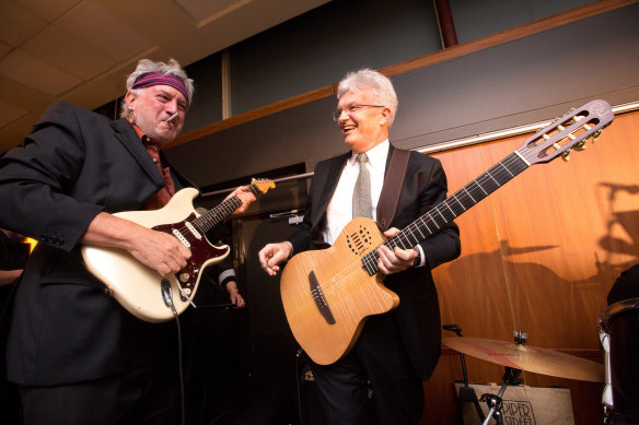 Deakin associate professor Rod Neilsen and former University of Melbourne vice-chancellor Glyn Davis on stage.