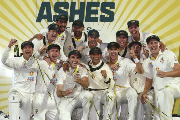 Usman Khawaja and the victorious Australia team celebrate without booze.