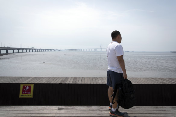 Kwon Pyong gazes out at the mud flat he became stranded on near Incheon, South Korea.