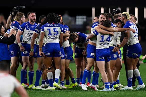 The Bulldogs celebrate victory over the Dragons in Las Vegas.