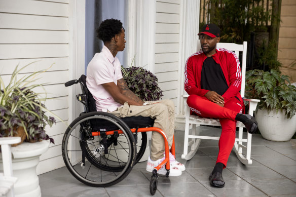 Ray Walker and Karamo Brown in a scene from season 7 of Queer Eye.