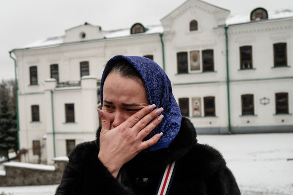 Dr Marina Shuyeva cries as she visited the grounds of the Monastery of the Caves in Kyiv. Her son, she said, was trapped in a basement in Kharkiv. She said she knew nothing of his fate.  
