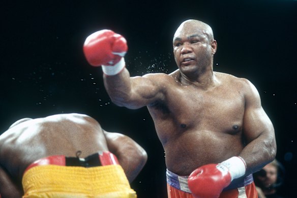 George Foreman and Michael Moorer fight for the WBA and IBF heavyweight titles.