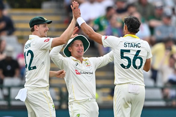 Mitchell Starc of Australia celebrates the wicket of Marco Jansen of South Africa on day one.