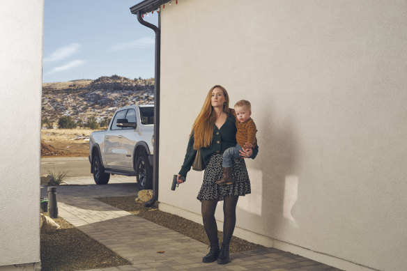 Jennie, with her Glock 43 and her son, Hugo.