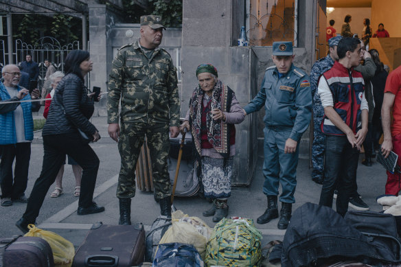 About 1500 people, including the young and old, crossed the border from the breakaway region of Nagorno-Karabakh on Sunday, days after a military offensive returned the ethnic Armenian enclave to Azerbaijan’s control.