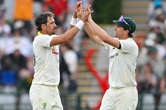 Mitchell Starc celebrates the wicket of Kagiso Rabada of South Africa.