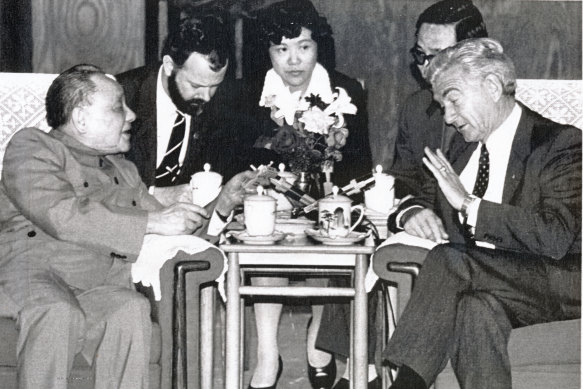 Bob Hawke declines a cigarette from Chinese leader Deng Xiaoping during their meeting in Beijing in 1986. Richard Rigby is second from left. 