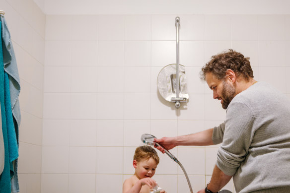 Stefano Baldo bathing his son, Ruben, before bedtime.