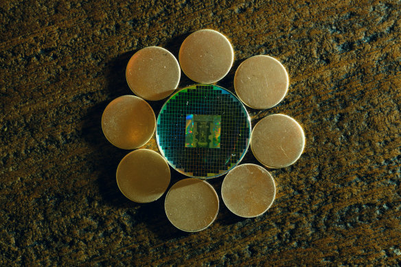 Isaac Asimov’s science-fiction novel “Foundation,” stored on a nickel-based NanoFiche disc surrounded by blank discs.