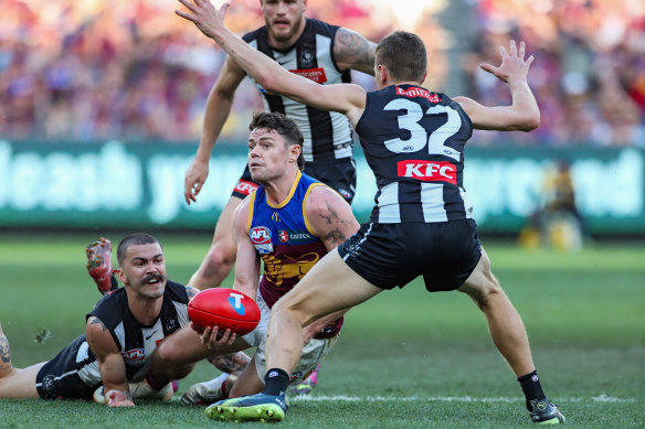 The moment: Lachie Neale was paid a free kick after this tackle from Oleg Markov.