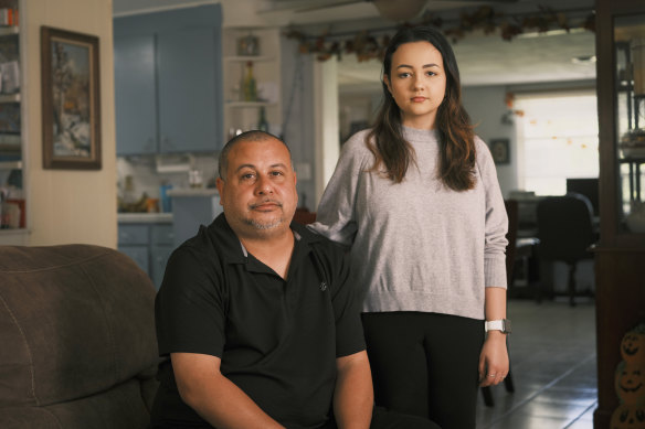 Angelina Mejia and her father Julio, who says his daughter tried to get out of a required JROTC class when she was a freshman and was initially refused.