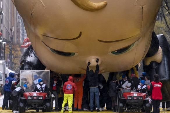 The Boss Baby balloon is deflated at the end of the modified Macy's Thanksgiving Day Parade in New York last week. 