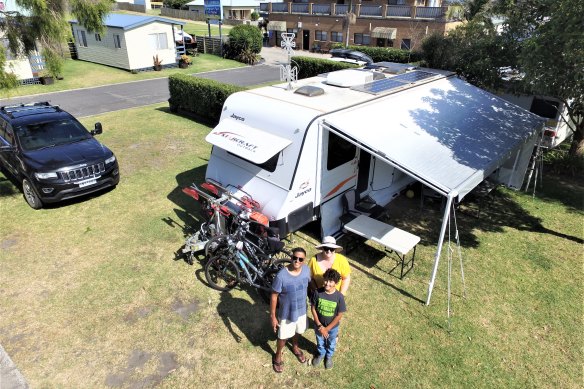 Colin Mitchell and his family at Marlo Caravan Park. They have lived in a caravan for three years and have no home to return to so are staying in the park.