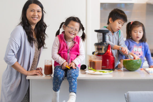 Melbourne-based Felicia Lau with her children Elsa, Jesse and Alysandra.