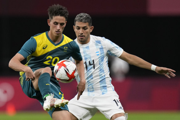 Australia’s Lachlan Wales is challenged by Argentina’s Facundo Medina.