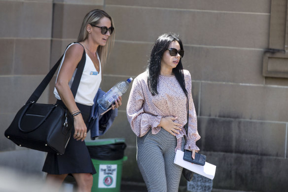 Kristy Torrisi (right) and Senior Constable Ayley Ross leave Darlinghurst court house after giving evidence on Tuesday. 