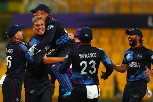 Ruben Trumpelmann of Namibia celebrates the wicket of Richard Berrington of Scotland during the T20 World Cup match between Scotland and Namibia.