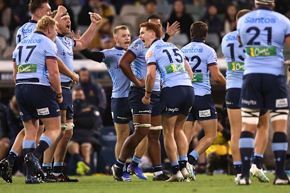 The Waratahs celebrate a great win in Canberra.