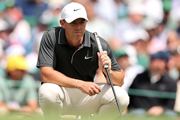 Rory McIlroy lines up a putt on Friday at Augusta.
