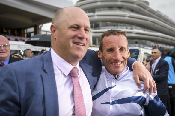 Danny O’Brien and jockey Damien Oliver after Miami Bound’s 2019 VRC Oaks win.