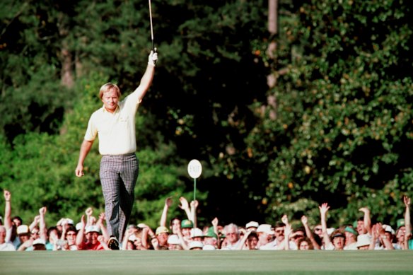 Jack Nicklaus raises his arm in victory after sinking his putt during the 1986 Masters Tournament at Augusta.