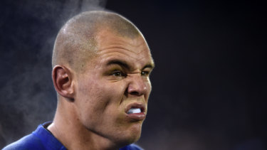 Watch out: Steam rises from Klemmer's head as he prepares to carry the ball back from a kick-off against Melbourne in 2015.